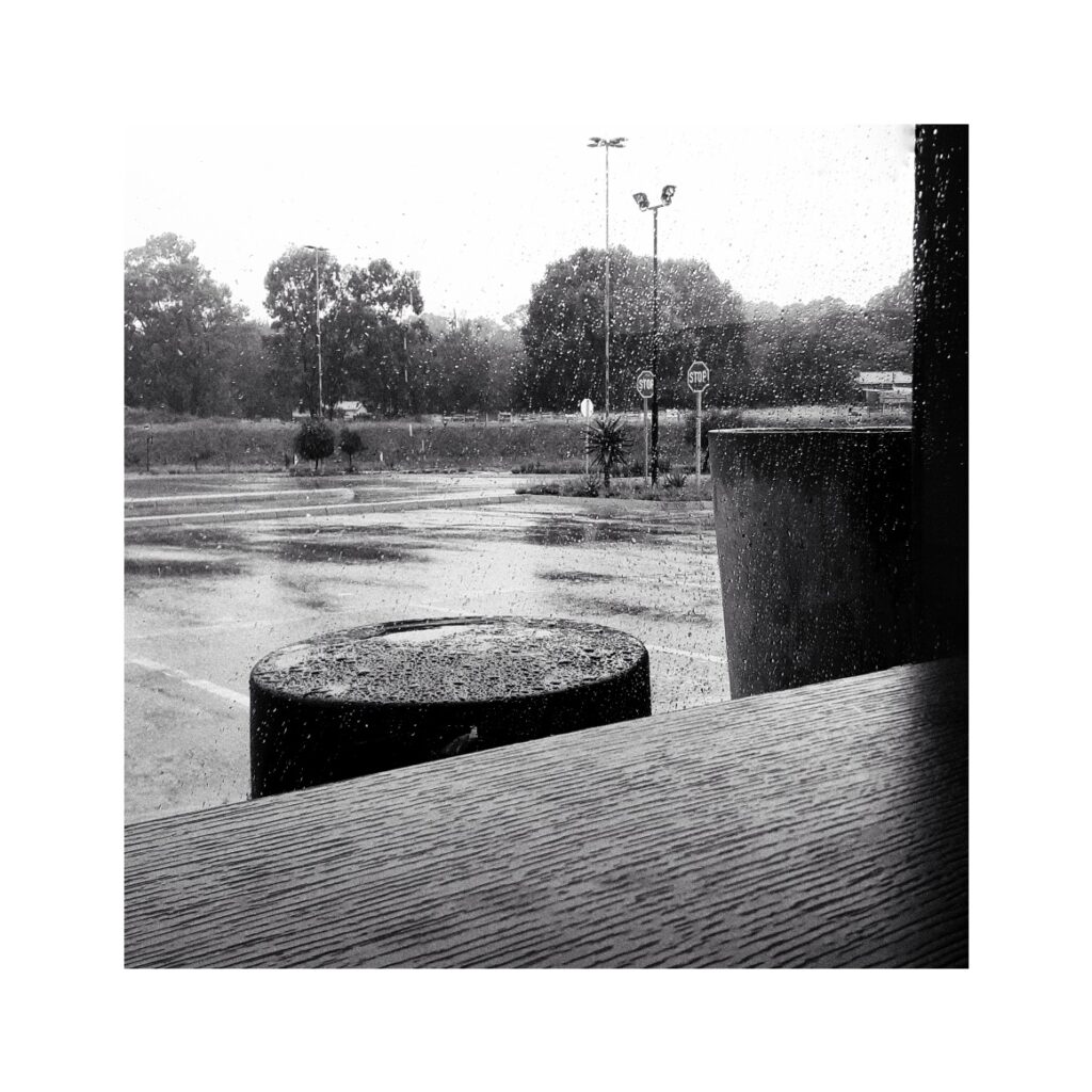 A photo through a rain-soaked window.