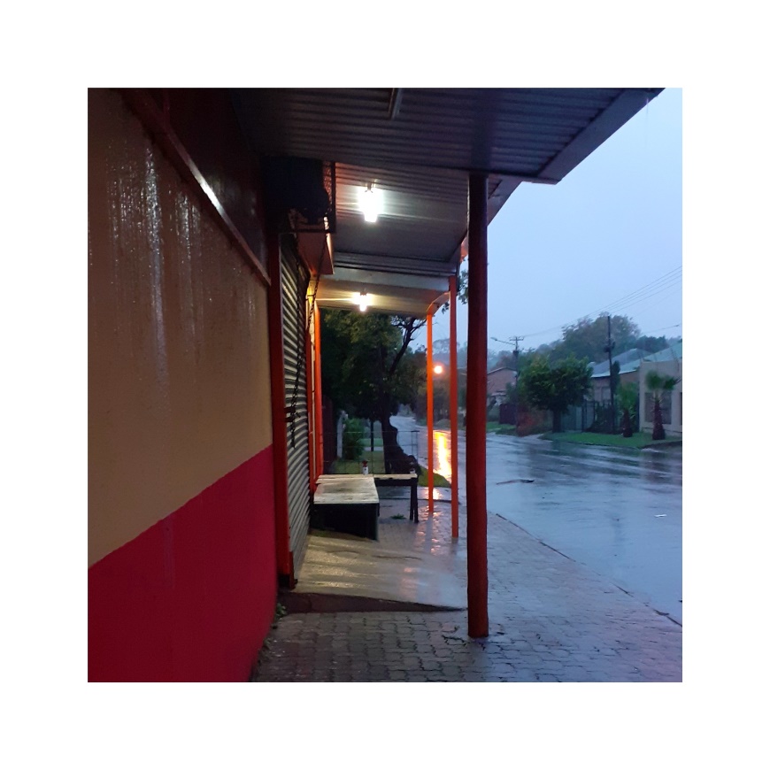 The outside of a fruit and vegetable shop.