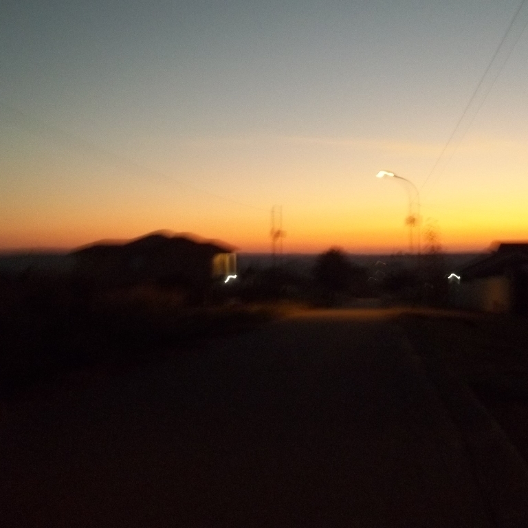 A photo of a blurry sunrise.