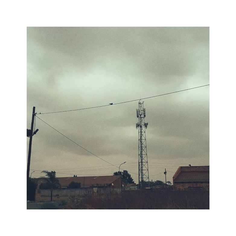 An overcast sky as backdrop against a telecoms tower.