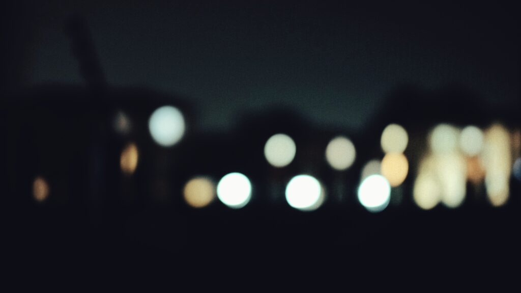 A group of lights which are out of focus.