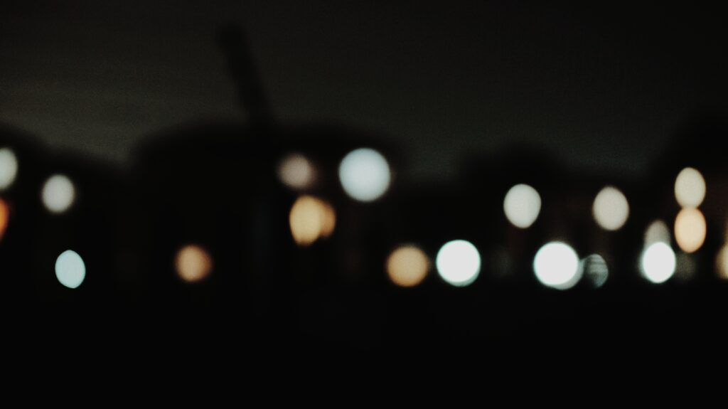 A group of lights which are out of focus.