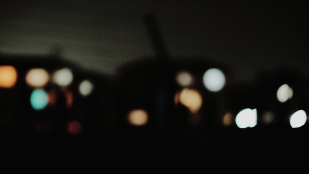 A group of lights which are out of focus.