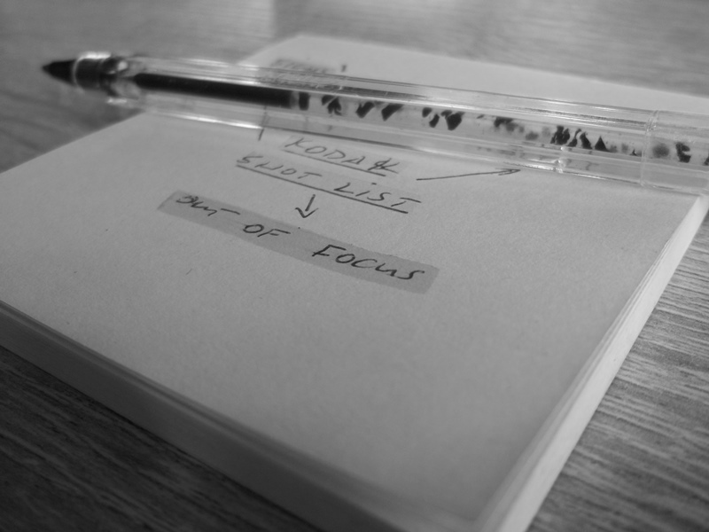A post-it note with the words 'out of focus' written on it.