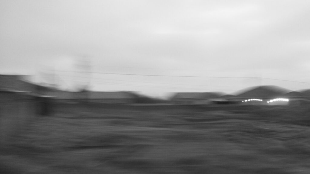 A blurry landscape photo.