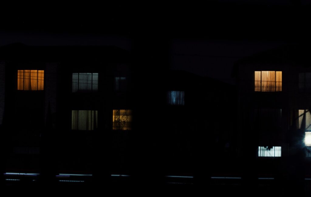 A set of windows in an apartment complex.