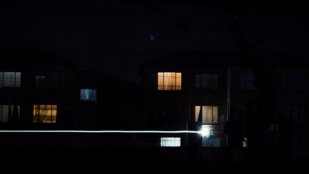 A set of windows in an apartment complex.